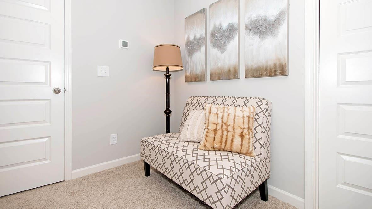 1734 Carter Daniel Drive Graham, NC 27253 - Photo 22 of 23 a bedroom with a bed and wooden floor