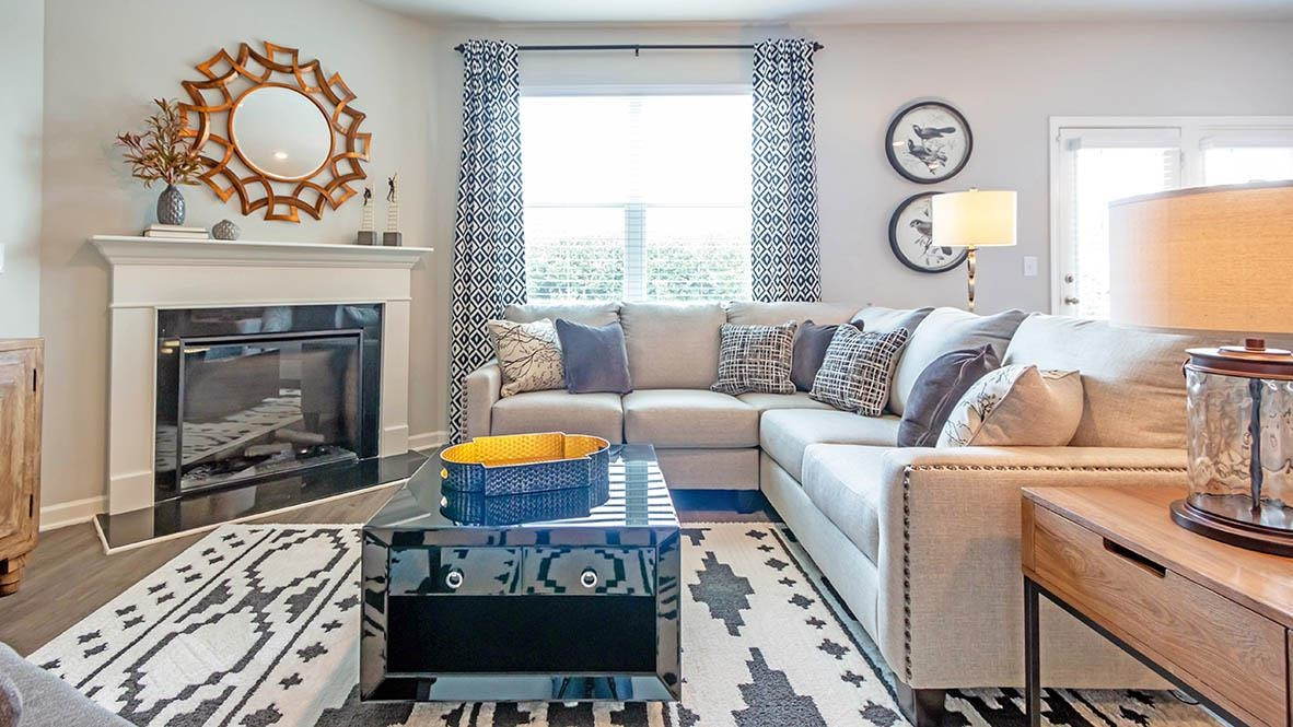 1734 Carter Daniel Drive Graham, NC 27253 - Photo 10 of 23 a living room with furniture a fireplace and window