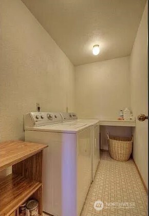 9502 South 200th Street Kent, WA 98031 - Photo 14 of 21 a bathroom with a sink and a toilet