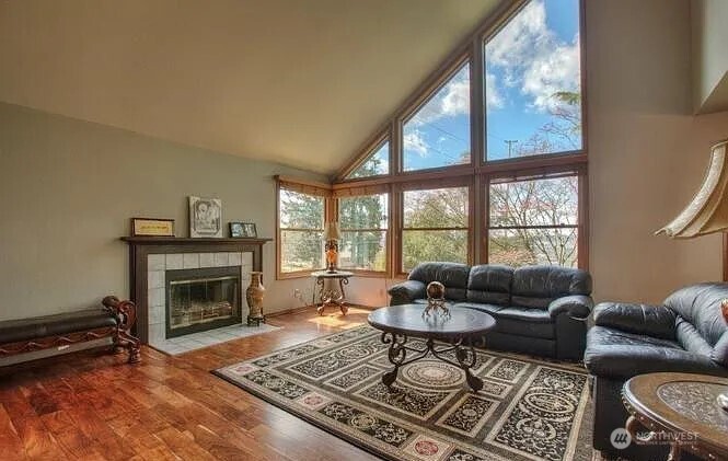 9502 South 200th Street Kent, WA 98031 - Photo 4 of 21 a living room with furniture and a fireplace