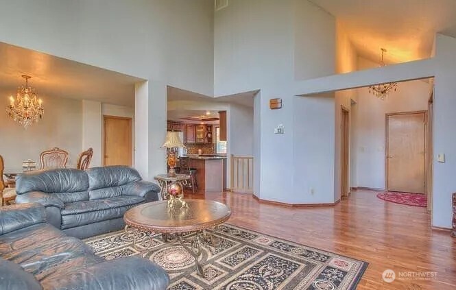 9502 South 200th Street Kent, WA 98031 - Photo 5 of 21 a living room with furniture and a rug