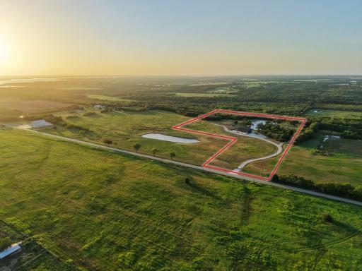 4251 Refuge Road Sherman, TX 75092 - Photo 39 of 40 an aerial view of a house with a ocean view