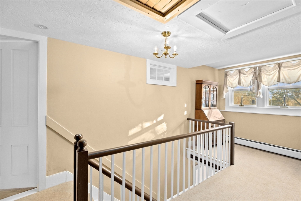 85 Summit Street Halifax, MA 02338 - Photo 19 of 42 a view of a hallway with windows