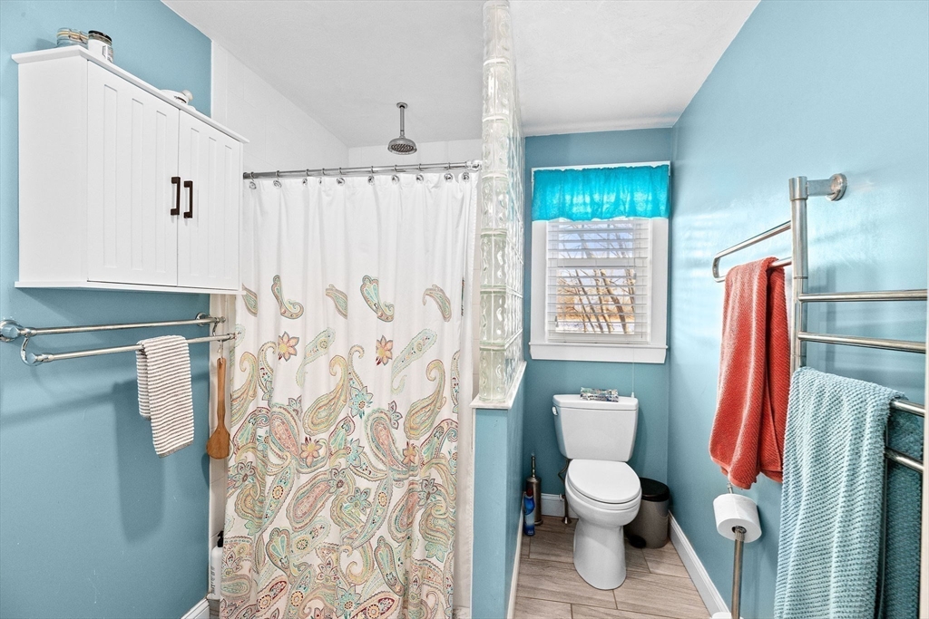 85 Summit Street Halifax, MA 02338 - Photo 31 of 42 a bathroom with a toilet and a shower