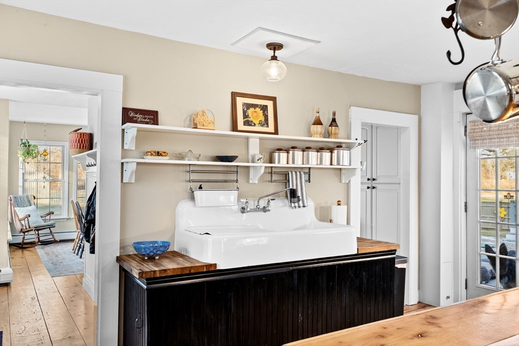 85 Summit Street Halifax, MA 02338 - Photo 6 of 42 a kitchen with stainless steel appliances a sink and a refrigerator