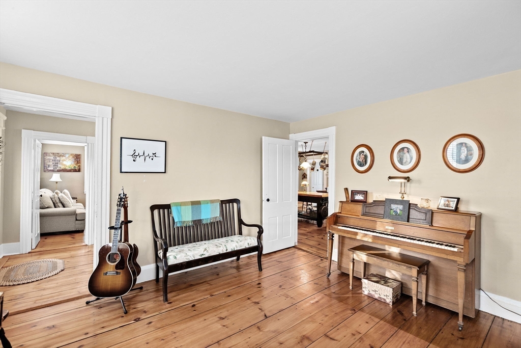 85 Summit Street Halifax, MA 02338 - Photo 9 of 42 a living room with furniture and a table