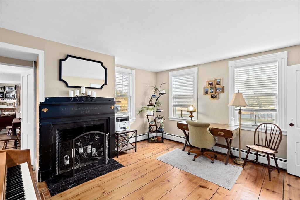 85 Summit Street Halifax, MA 02338 - Photo 10 of 42 a living room with furniture and a fireplace