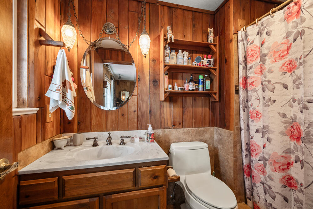 47477 Gerber Road Bonanza, OR 97623 - Photo 43 of 63 a bathroom with a sink and a mirror