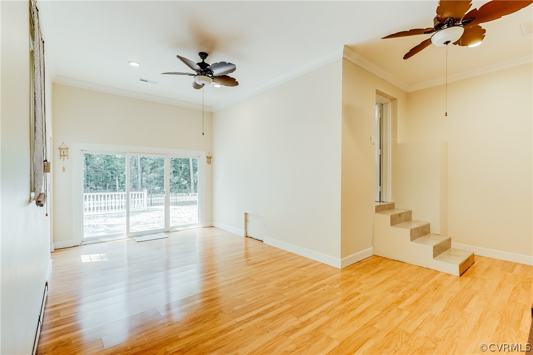 3918 Oxbridge Road North Chesterfield, VA 23236 - Photo 18 of 48 a view of a room with wooden floor and fan