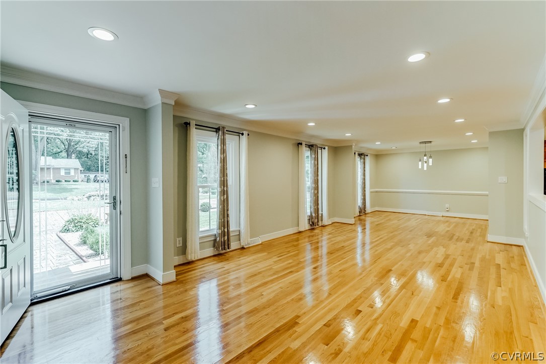 3918 Oxbridge Road North Chesterfield, VA 23236 - Photo 3 of 48 a view of an empty room with wooden floor and a window