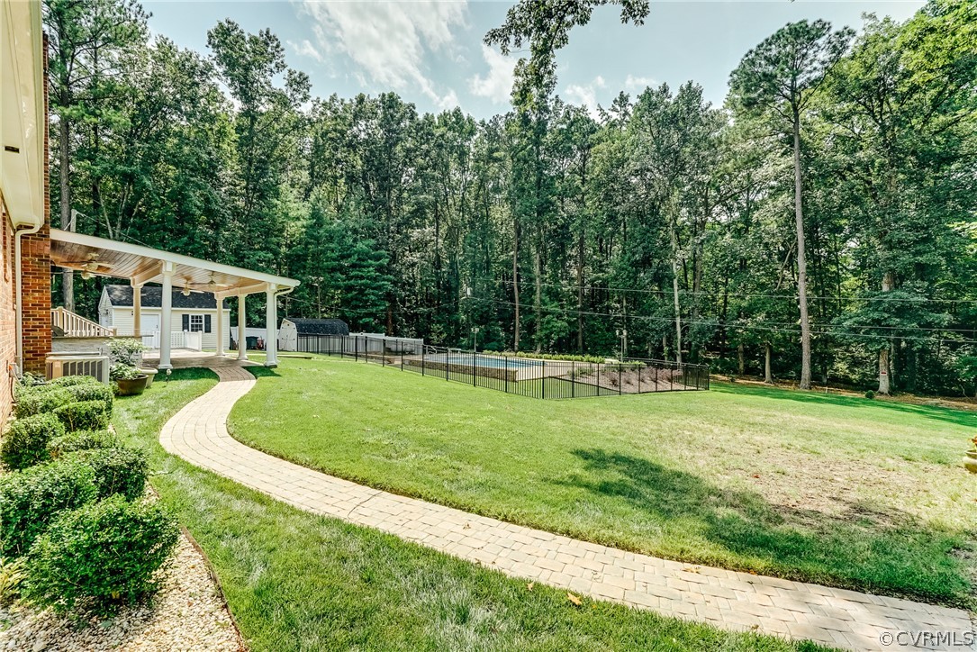 3918 Oxbridge Road North Chesterfield, VA 23236 - Photo 32 of 48 a view of a house with a backyard