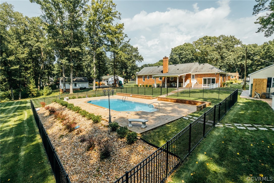 3918 Oxbridge Road North Chesterfield, VA 23236 - Photo 35 of 48 an aerial view of a house with swimming pool garden and patio