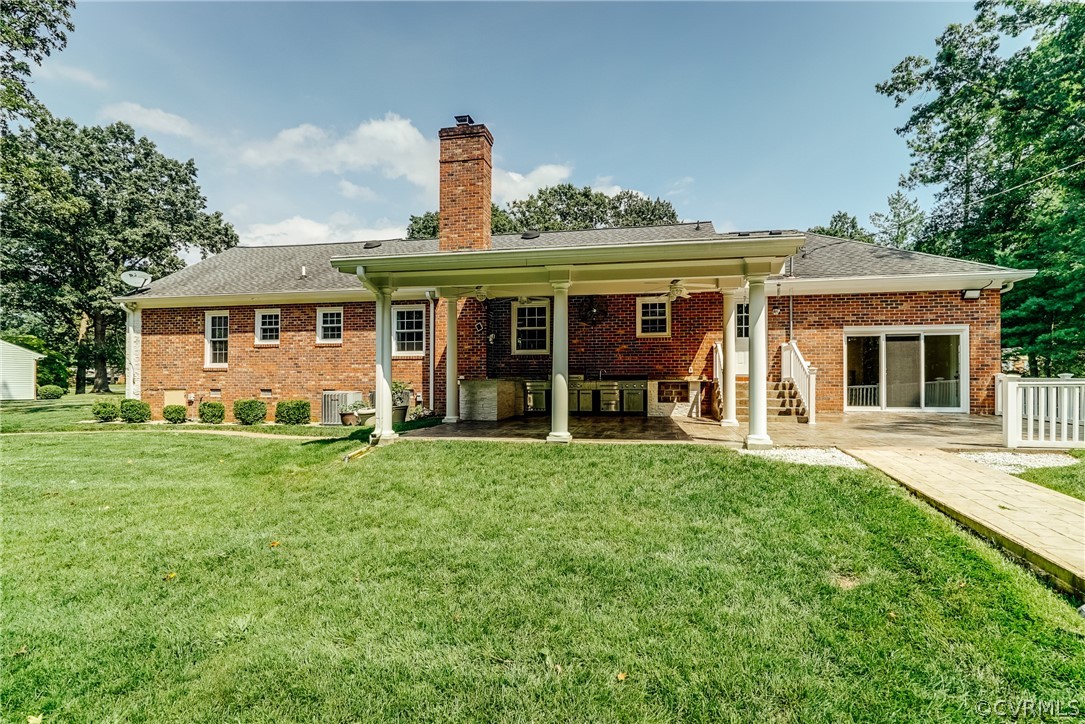 3918 Oxbridge Road North Chesterfield, VA 23236 - Photo 38 of 48 a front view of a house with a garden