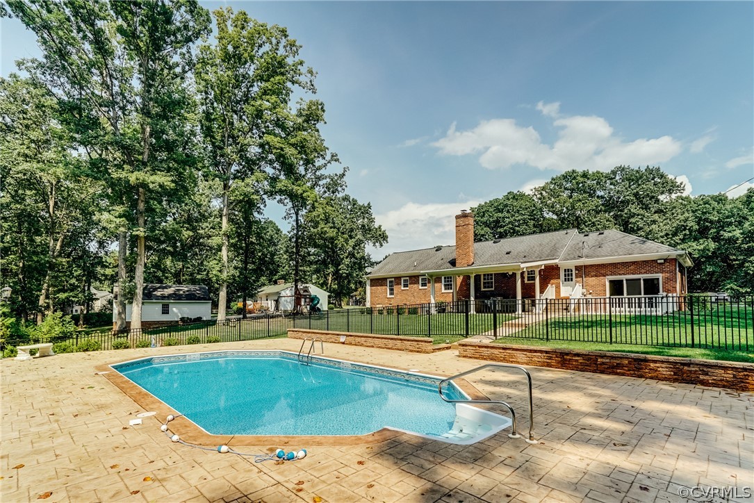 3918 Oxbridge Road North Chesterfield, VA 23236 - Photo 41 of 48 a view of a swimming pool and a yard
