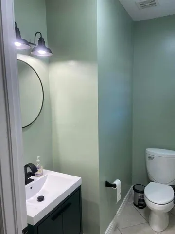 a bathroom with a sink and a toilet