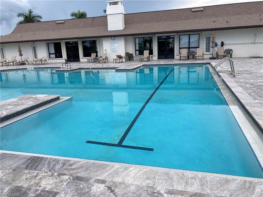 32 Lemans Drive Naples, FL 34112 - Photo 32 of 49 a view of a house with pool
