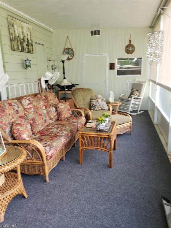 32 Lemans Drive Naples, FL 34112 - Photo 43 of 49 a bedroom with furniture and a window