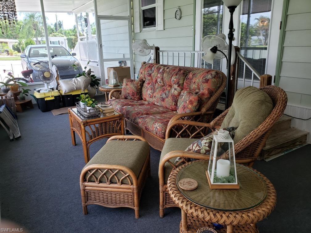 32 Lemans Drive Naples, FL 34112 - Photo 6 of 49 a living room with furniture