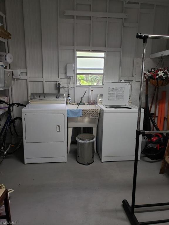 32 Lemans Drive Naples, FL 34112 - Photo 8 of 49 a room with storage and utility