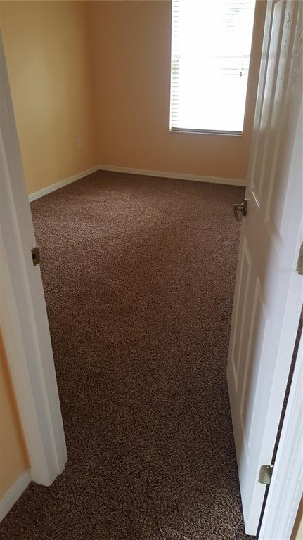 118 Philadelphia Way Winter Springs, FL 32708 - Photo 11 of 20 an empty room with a window