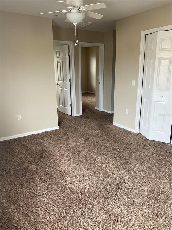 118 Philadelphia Way Winter Springs, FL 32708 - Photo 17 of 20 a view of a big room with closet and chandelier fan