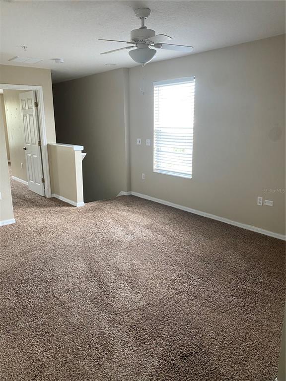118 Philadelphia Way Winter Springs, FL 32708 - Photo 20 of 20 an empty room with windows and fan