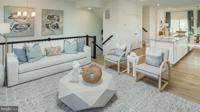 a living room with furniture and a table