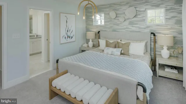 a bedroom with a bed and a table