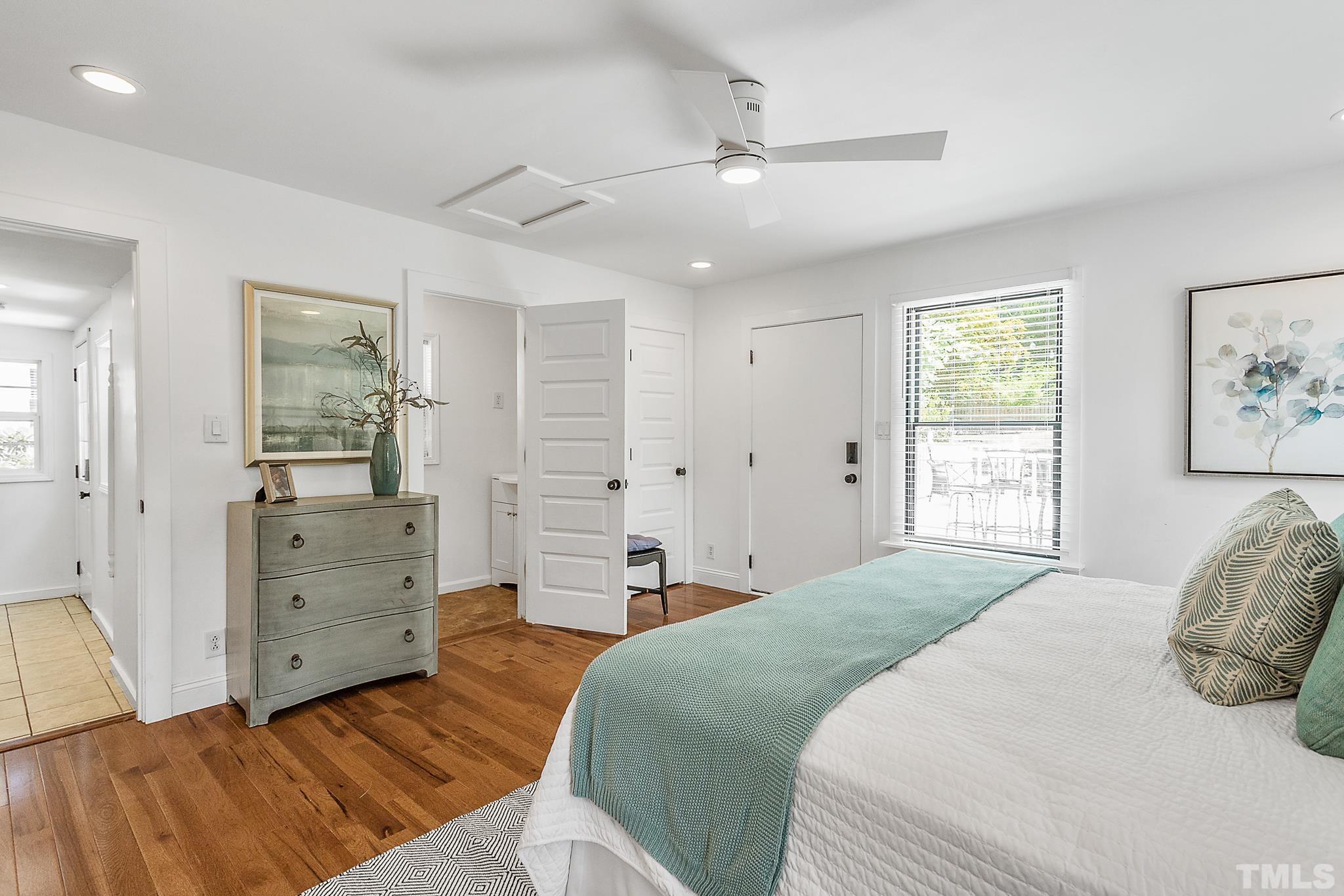 2222 Glascock Street Raleigh, NC 27610 - Photo 14 of 20 a bedroom with a bed and a dresser