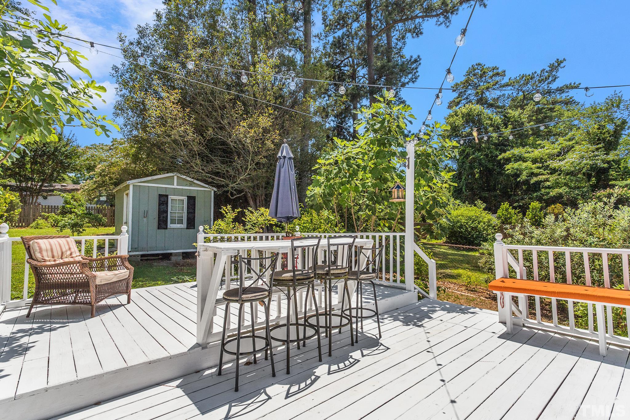 2222 Glascock Street Raleigh, NC 27610 - Photo 15 of 20 a view of a deck with furniture and wooden floor