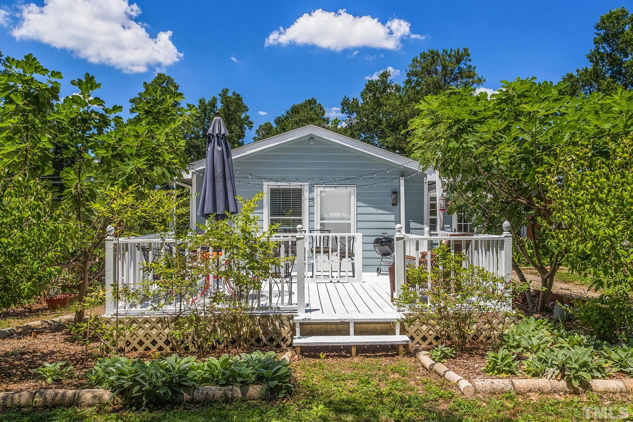 2222 Glascock Street Raleigh, NC 27610 - Photo 19 of 20 a house view with a garden space