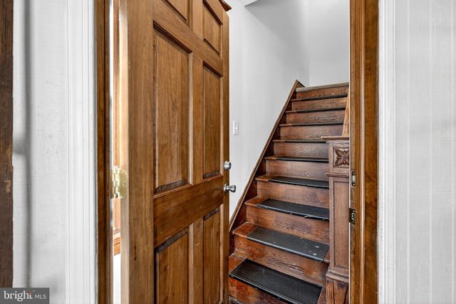a kitchen with a stove and a sink