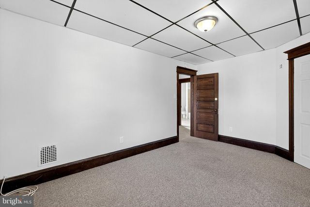 a view of a wooden roof deck