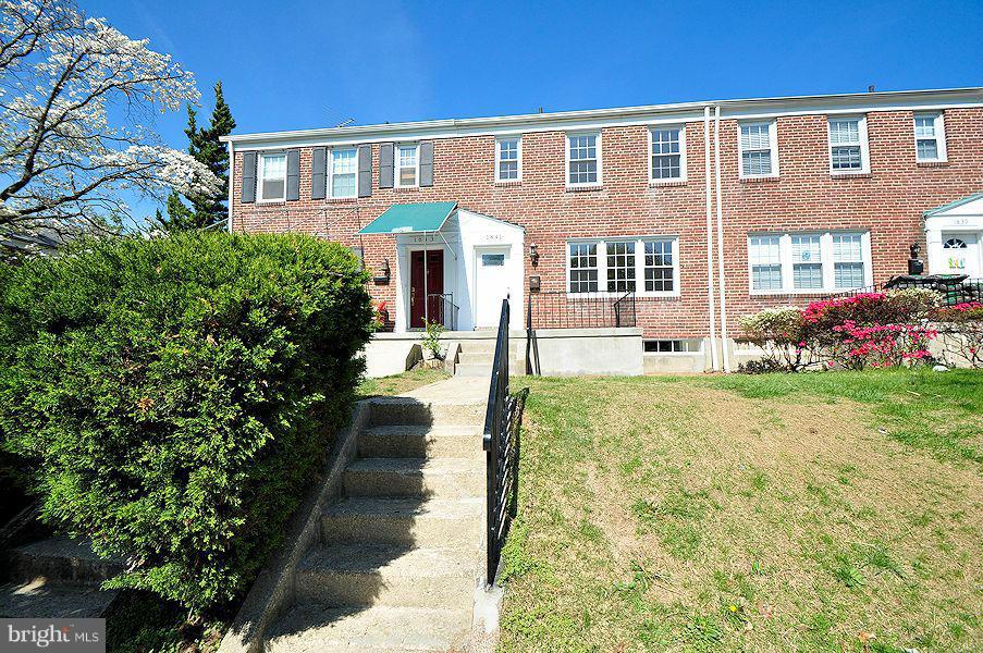 1841 Loch Shiel Road Baltimore, MD 21286 - Photo 1 of 23 a front view of a house with garden