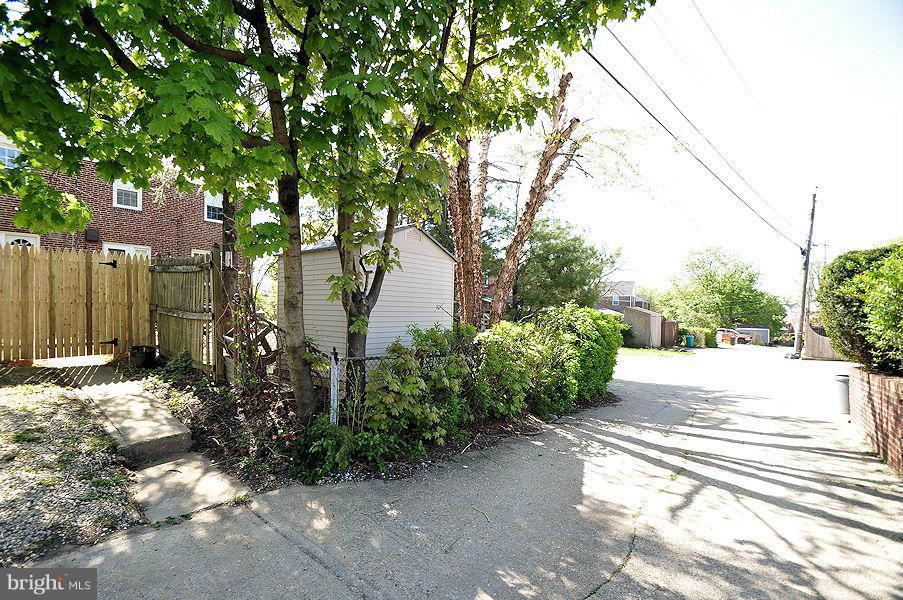 1841 Loch Shiel Road Baltimore, MD 21286 - Photo 21 of 23 a view of a street with plants and trees