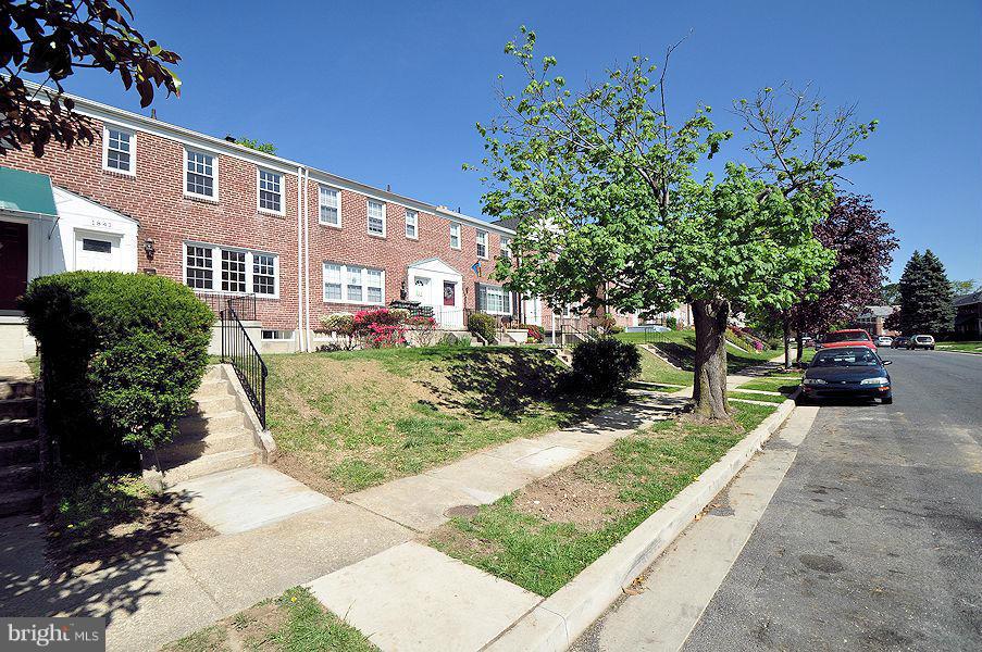 1841 Loch Shiel Road Baltimore, MD 21286 - Photo 23 of 23 a view of a street with cars parked on the road