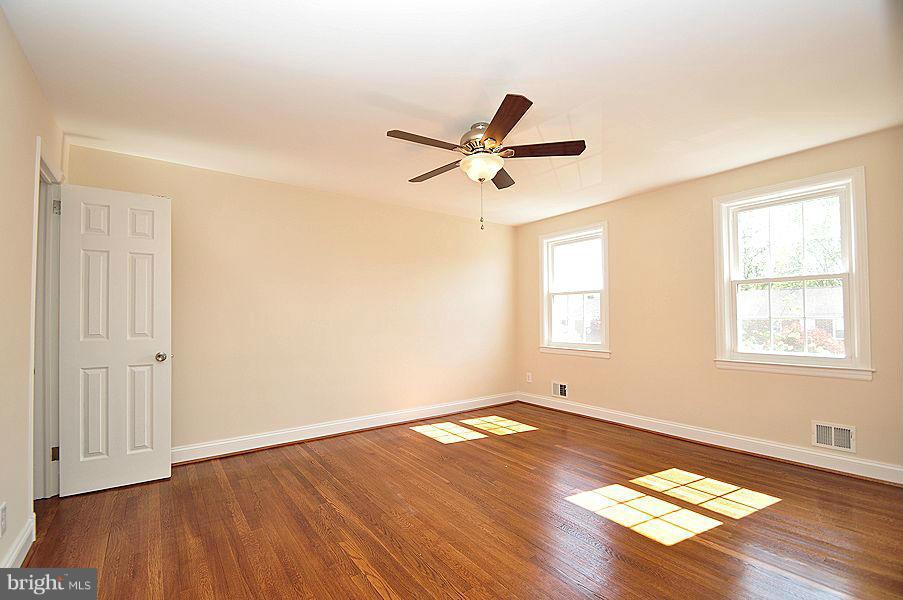 1841 Loch Shiel Road Baltimore, MD 21286 - Photo 10 of 23 a view of room with wooden floor and window