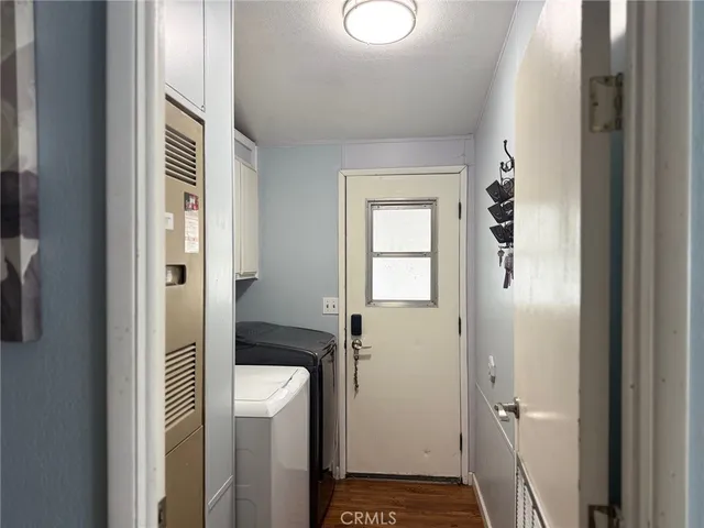a bathroom with a granite countertop shower and a toilet
