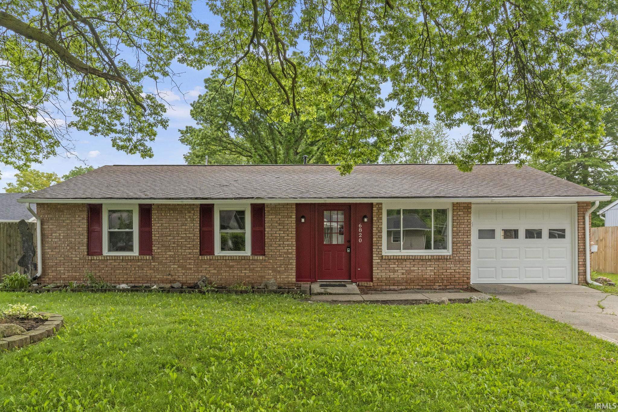 6820 Raintree Road Fort Wayne, IN 46825 - Photo 1 of 33