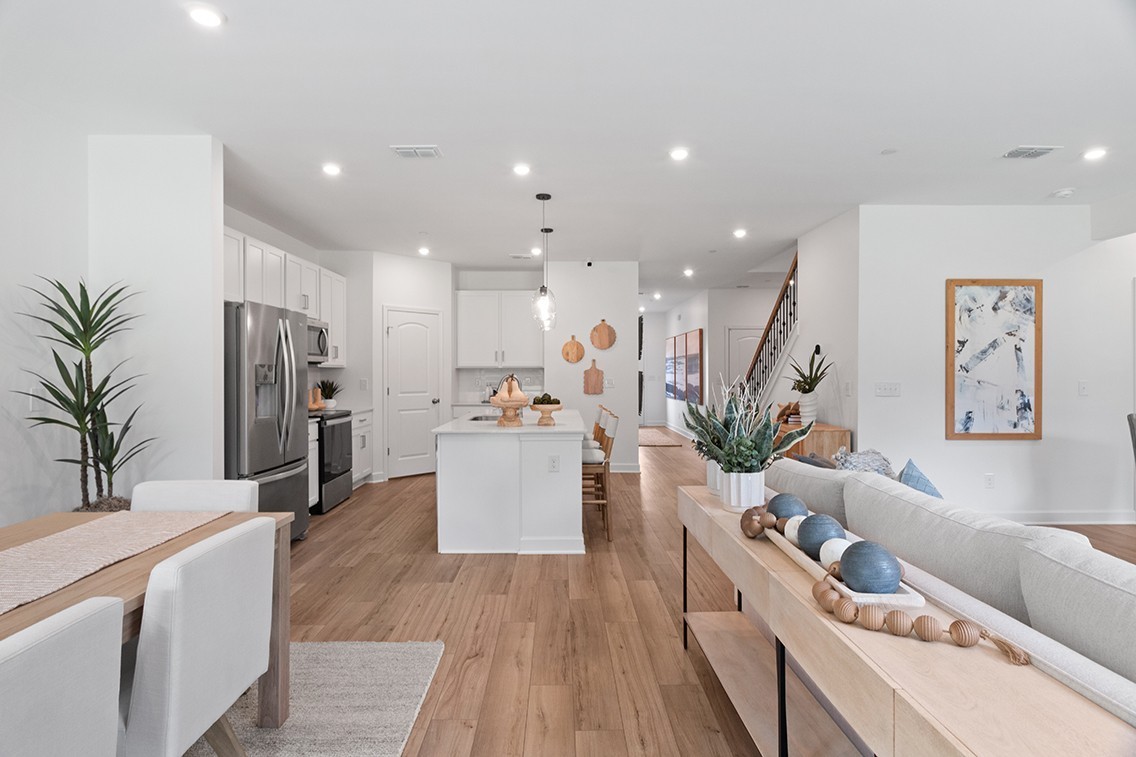 204 East Millbrook Drive Spring Hill, TN 37174 - Photo 14 of 38 a living room with furniture and a wooden floor