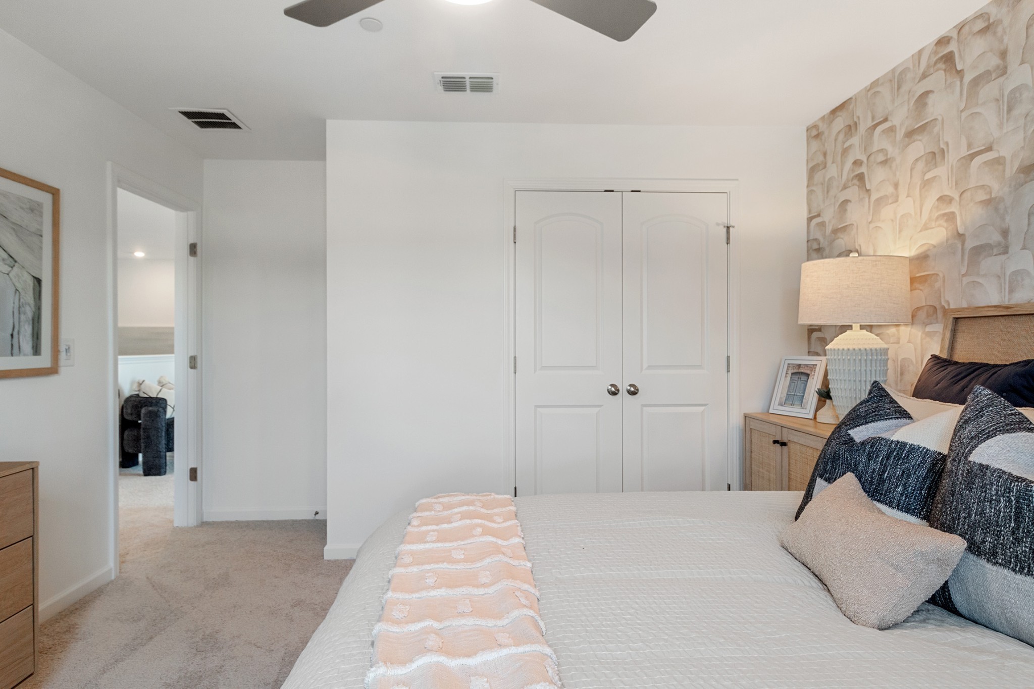 204 East Millbrook Drive Spring Hill, TN 37174 - Photo 29 of 38 a bedroom with a bed and a couch