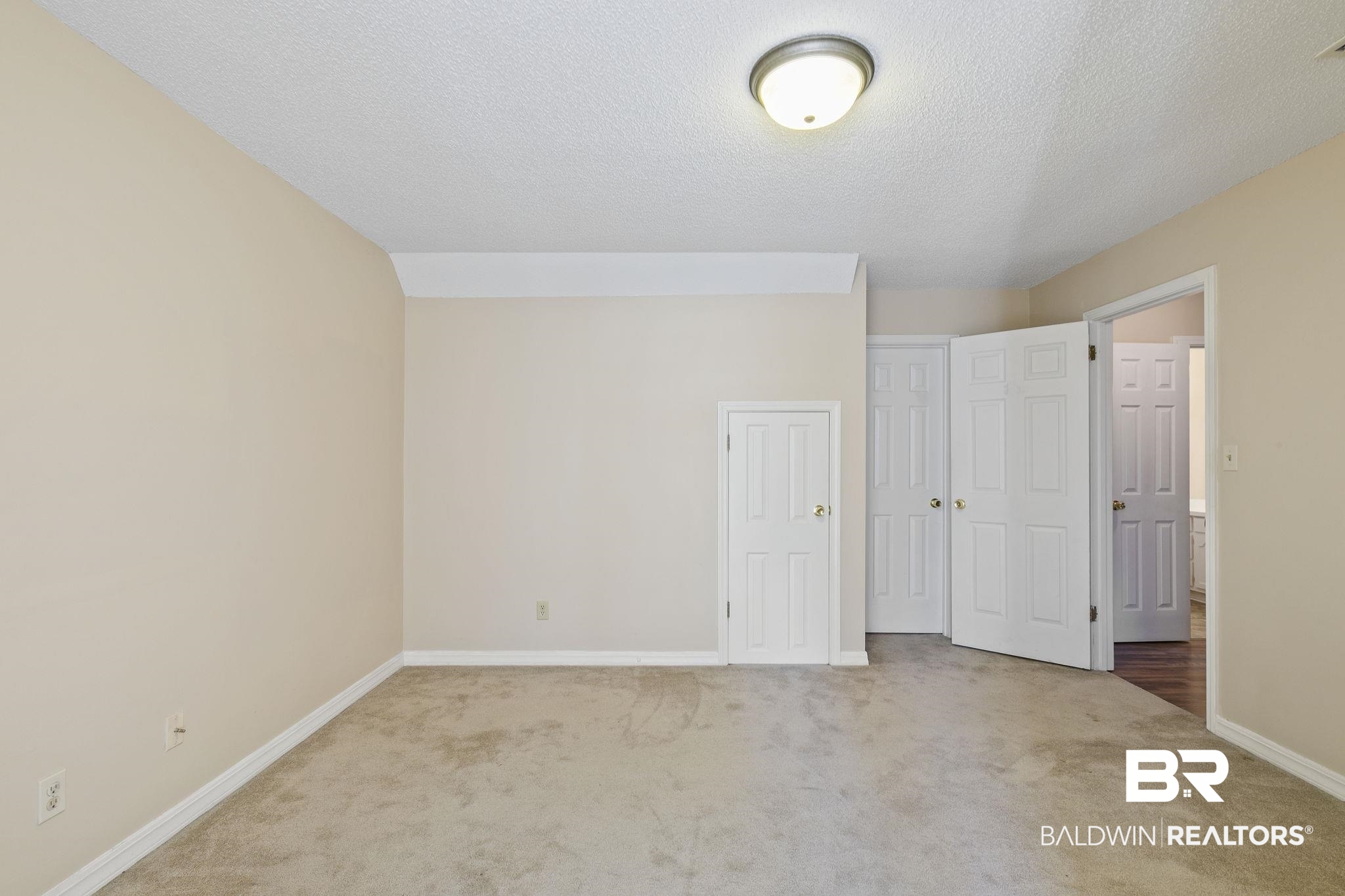 359 Ridgewood Drive Daphne, AL 36526 - Photo 34 of 73 Bedroom upstairs with oversized walk in closet and additional storage closet