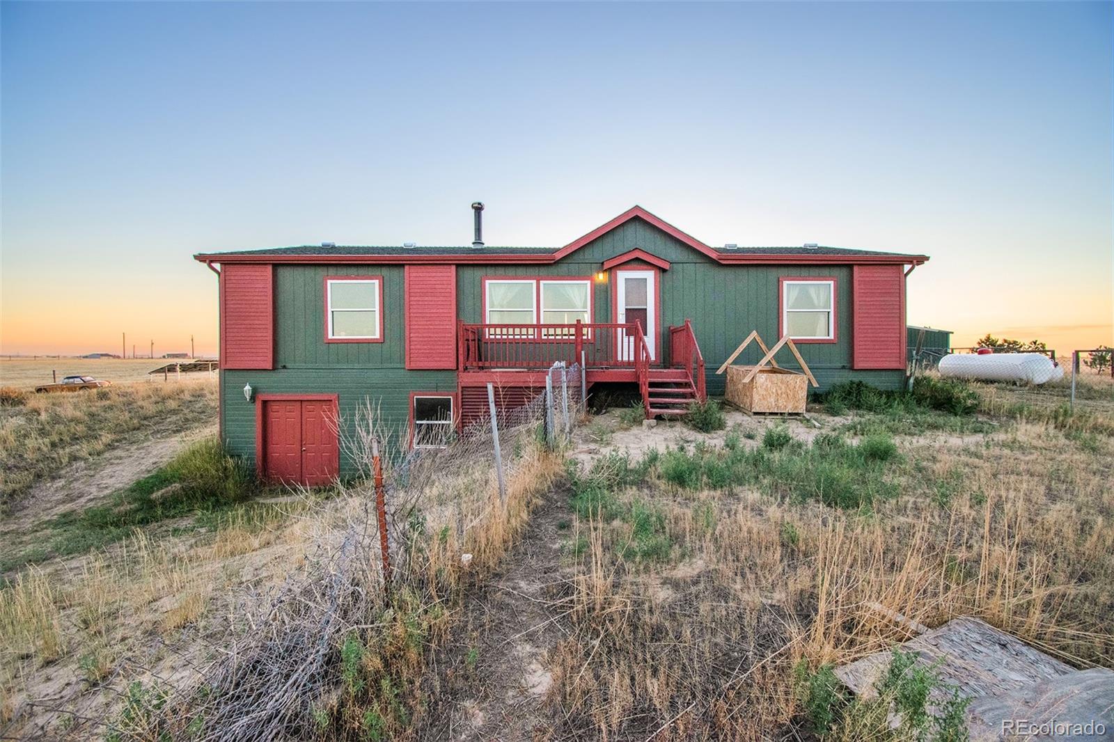 7337 Schumaker Road Bennett, CO 80102 - Photo 1 of 22 Gallery Image 1