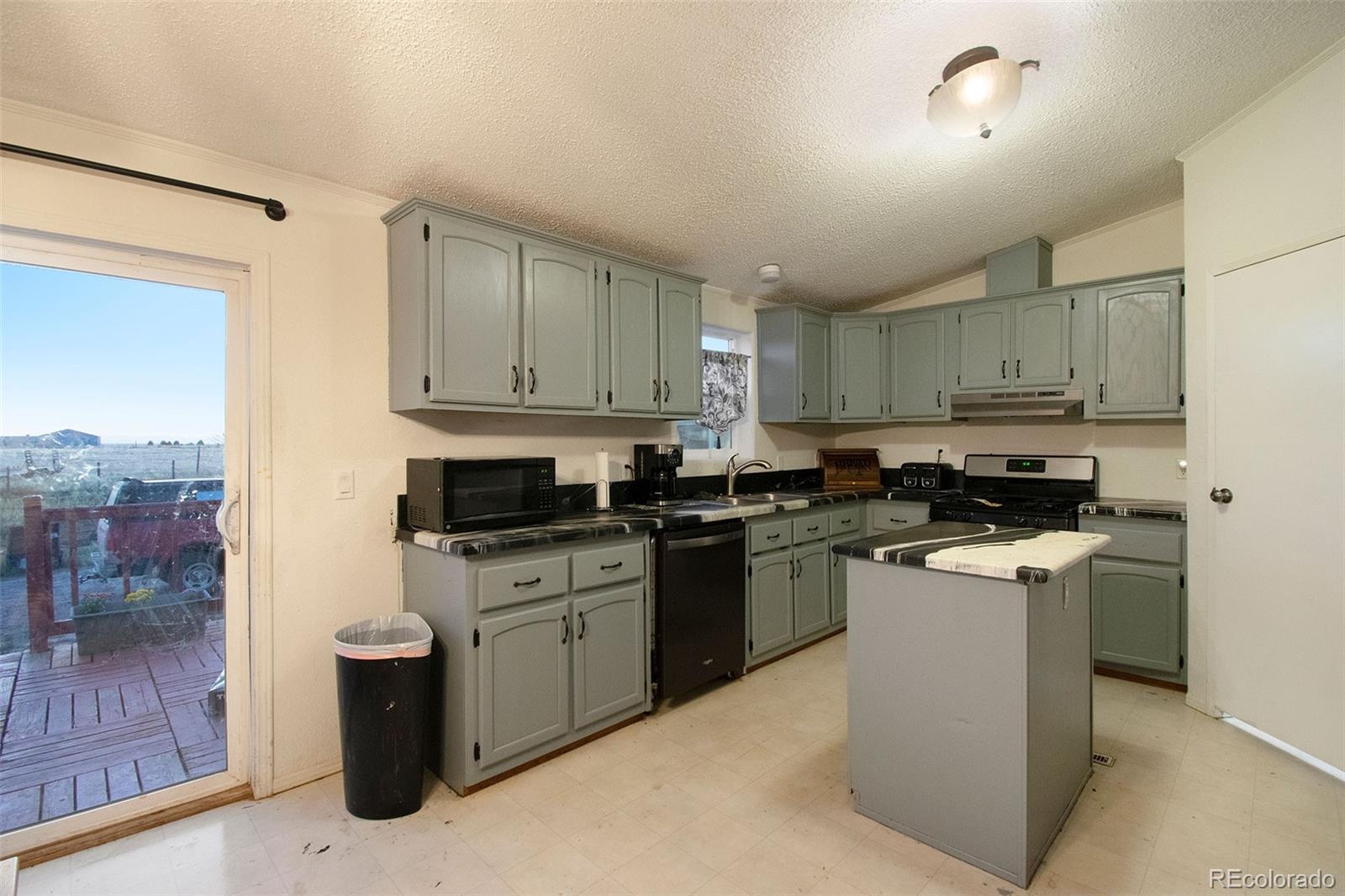 7337 Schumaker Road Bennett, CO 80102 - Photo 4 of 22 Gallery Image 4