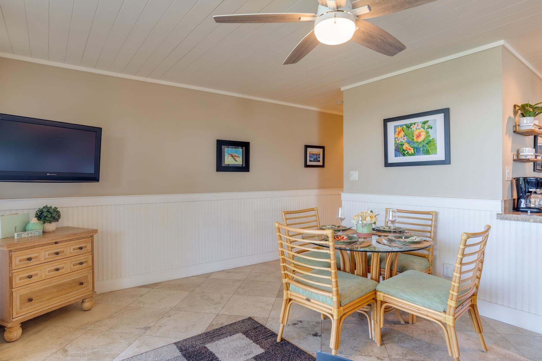 3601 Lower Honoapiilani Road, Unit 210 Lahaina, HI 96761 - Photo 12 of 25 a view of a dining room with furniture and chandelier