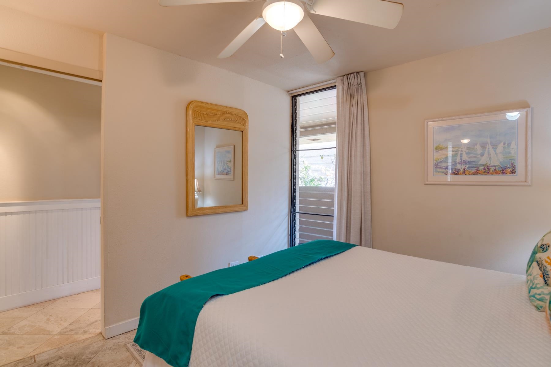 3601 Lower Honoapiilani Road, Unit 210 Lahaina, HI 96761 - Photo 18 of 25 a bedroom with a bed and a window