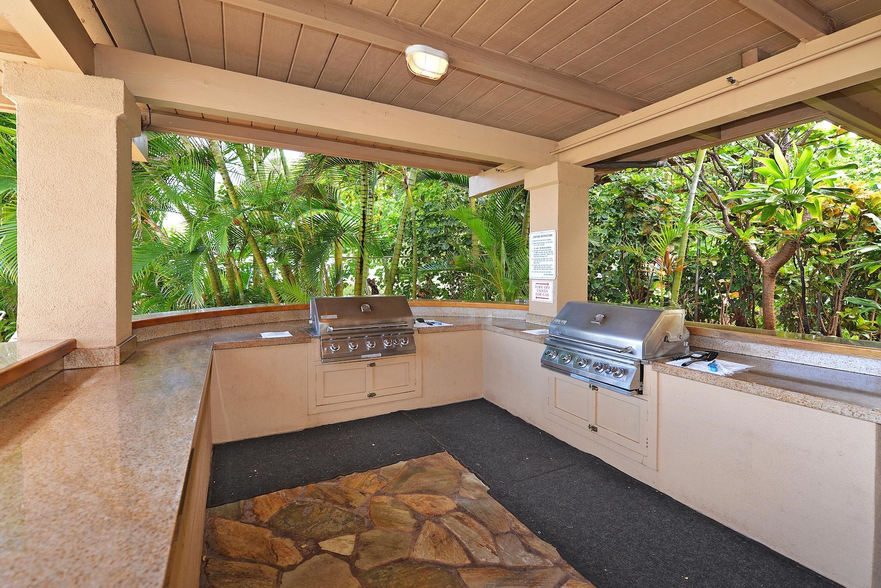 3601 Lower Honoapiilani Road, Unit 210 Lahaina, HI 96761 - Photo 22 of 25 a view of a large white kitchen with a large window