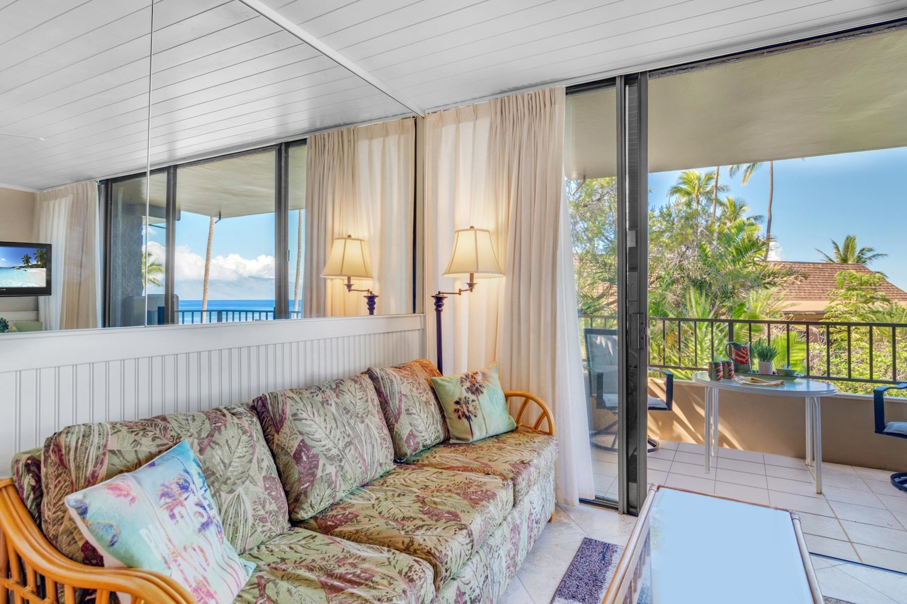 3601 Lower Honoapiilani Road, Unit 210 Lahaina, HI 96761 - Photo 8 of 25 a living room with furniture and a potted plant
