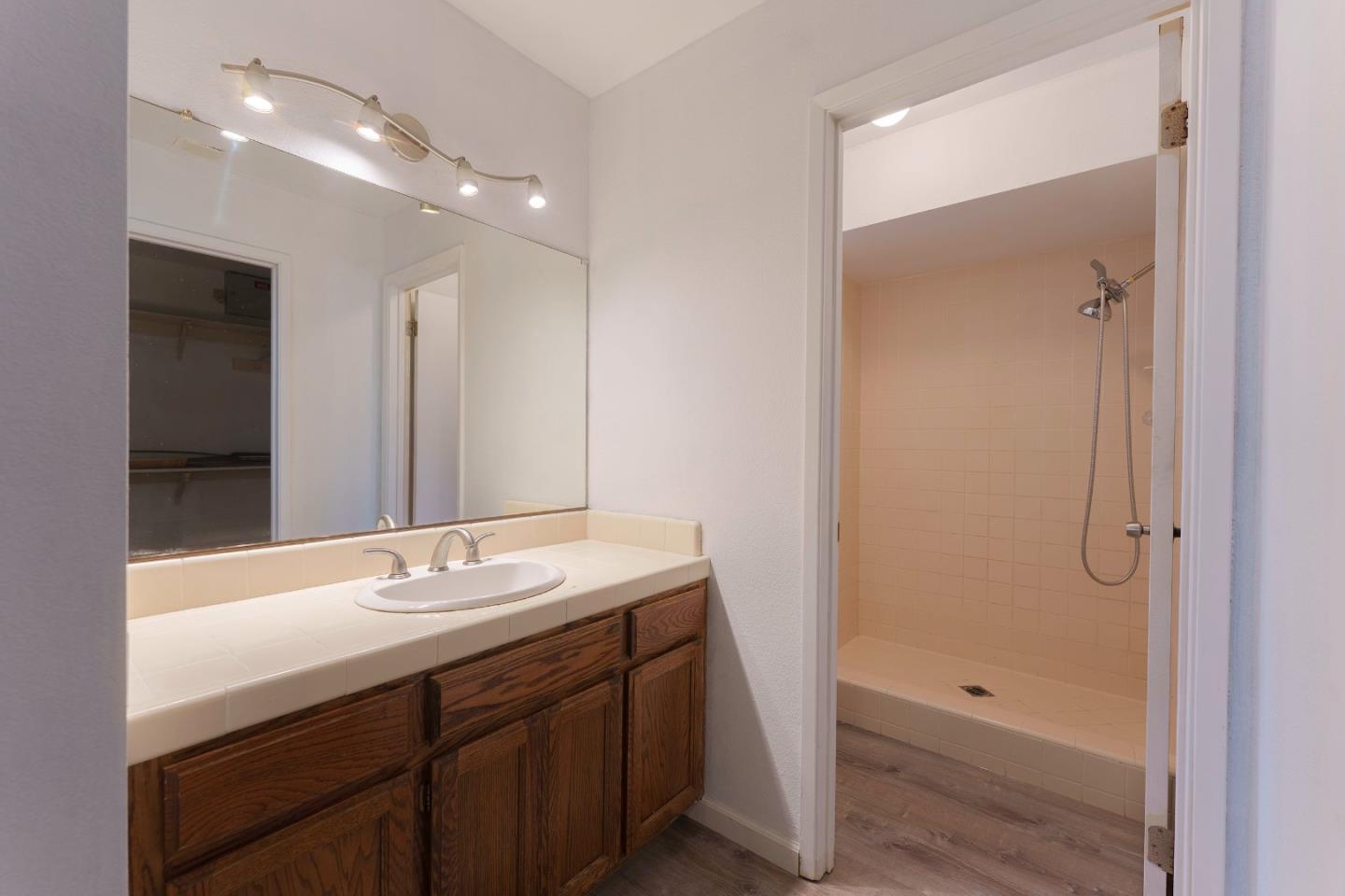 1549 North First Street Salinas, CA 93906 - Photo 17 of 25 a bathroom with a sink a toilet and shower