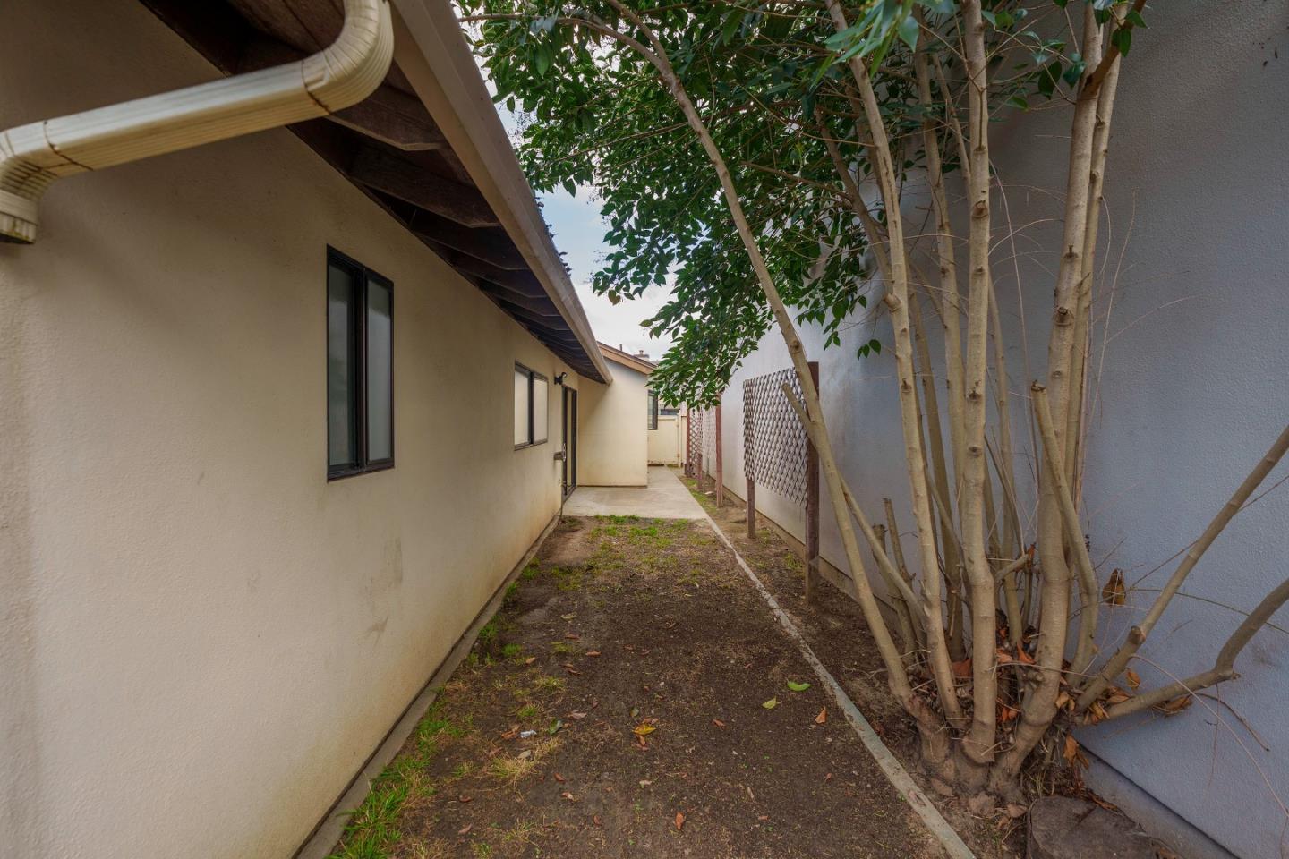1549 North First Street Salinas, CA 93906 - Photo 25 of 25 a view of a pathway of a house with wooden fence